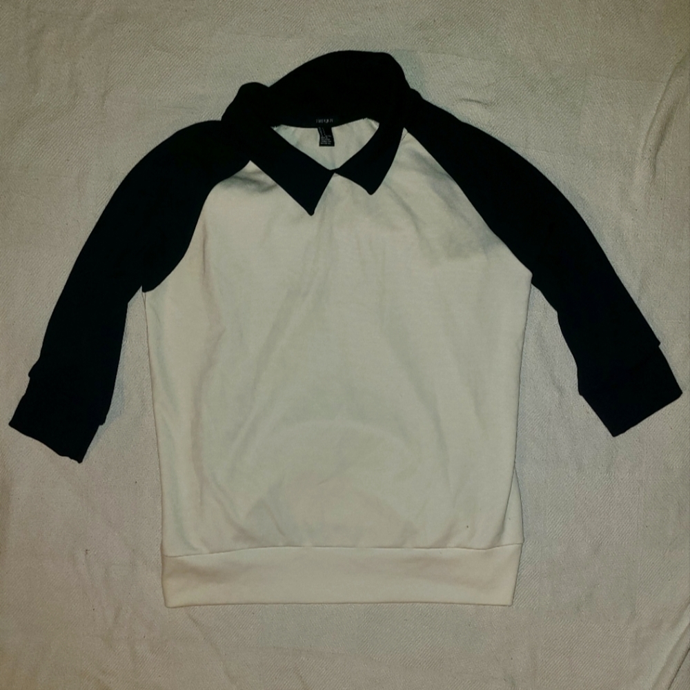 "Forever 21" size large black and white quarter sleeve shirt